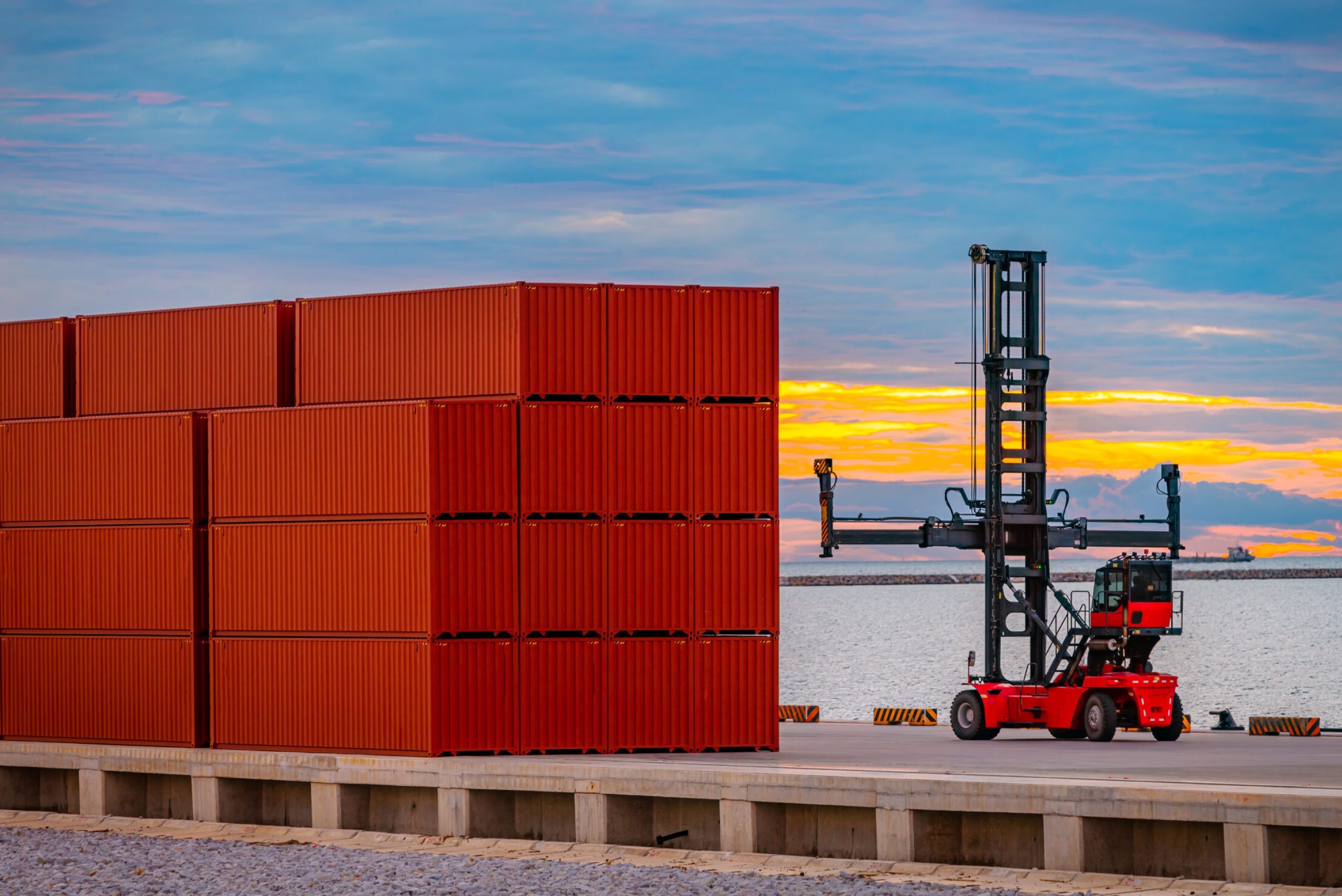 cargo-ship-and-truck-at-seaport-waiting-for-contai-2023-11-27-05-12-43-utc